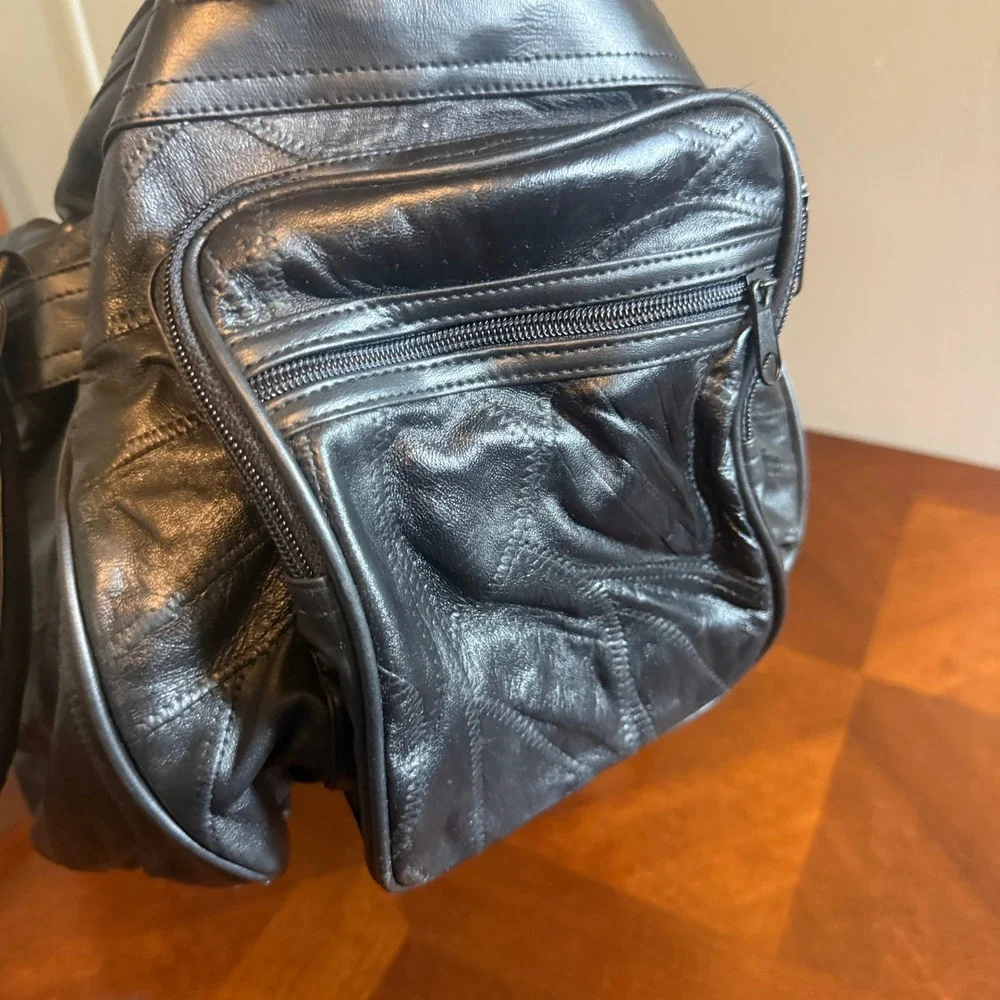 Black Patchwork Genuine Leather 4 Piece Travel Set Duffel Backpack Fanny Pack